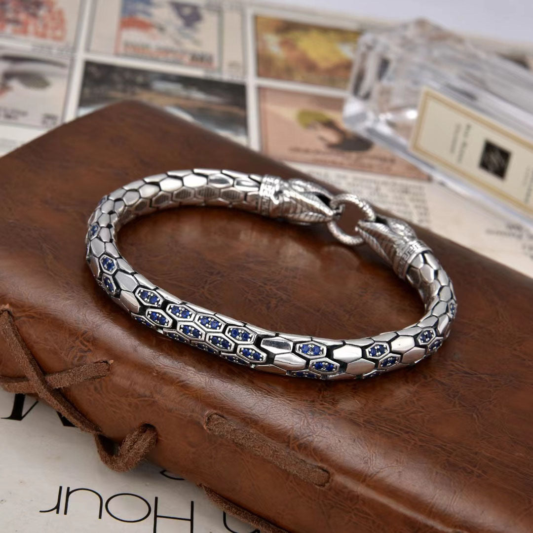 Double snake patterned diamond encrusted bracelet