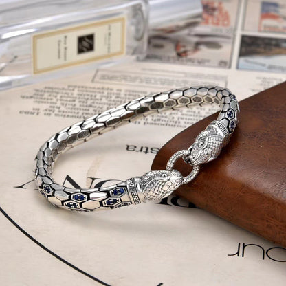Double snake patterned diamond encrusted bracelet