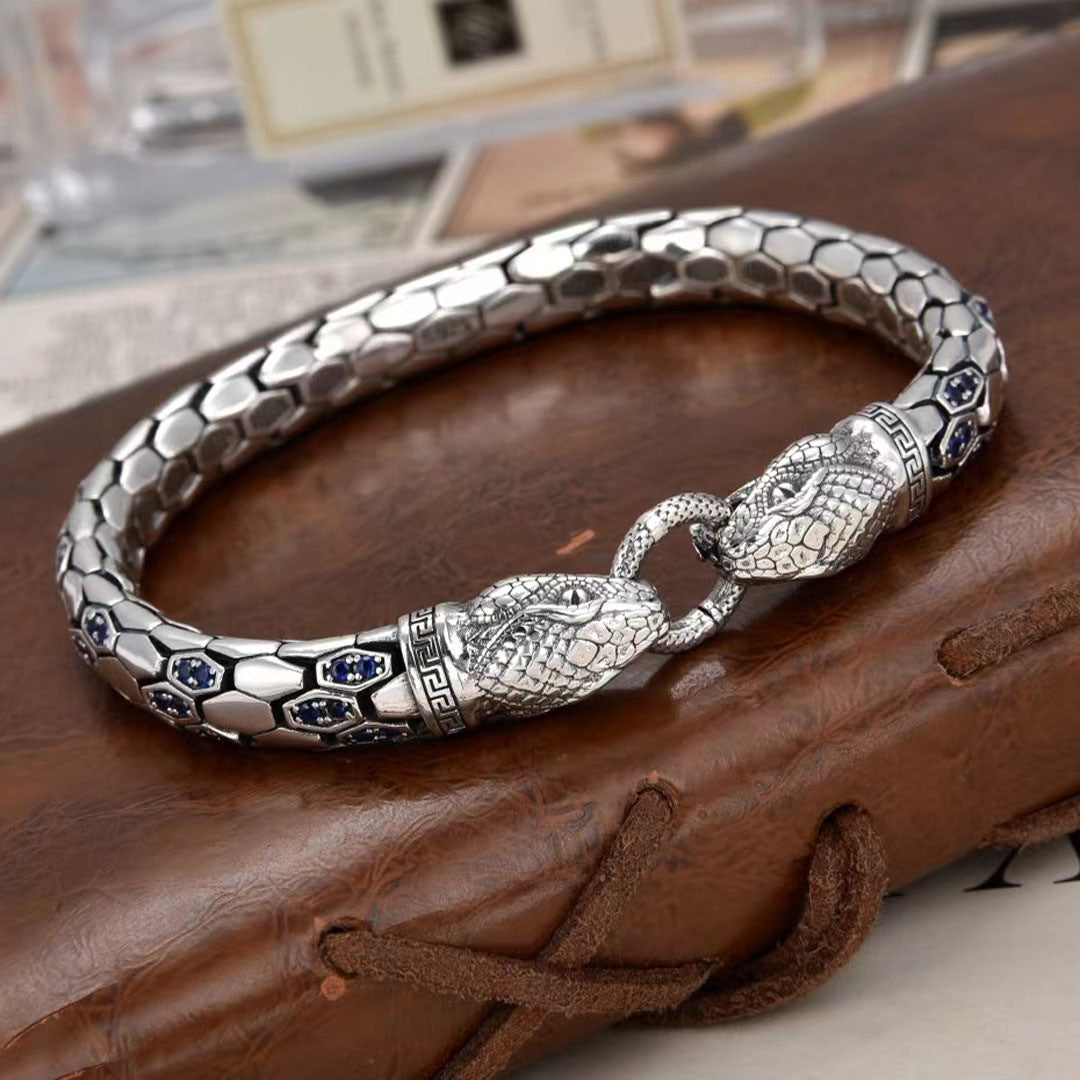Double snake patterned diamond encrusted bracelet