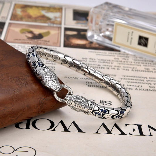 Double snake patterned diamond encrusted bracelet